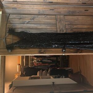 Black formal dress worn once in perfect condition.